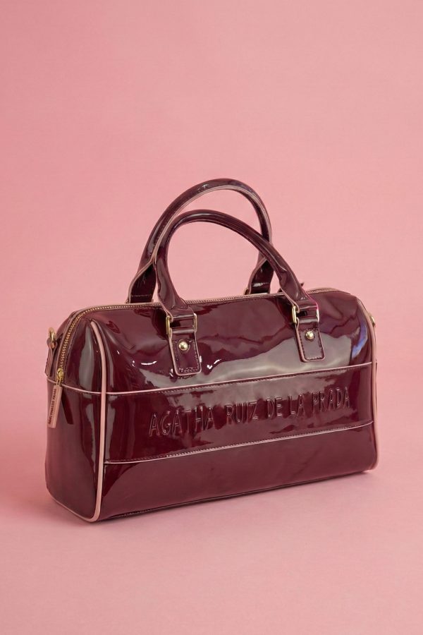 Bolso bowling de charol Agatha Ruiz de la Prada en color granate.