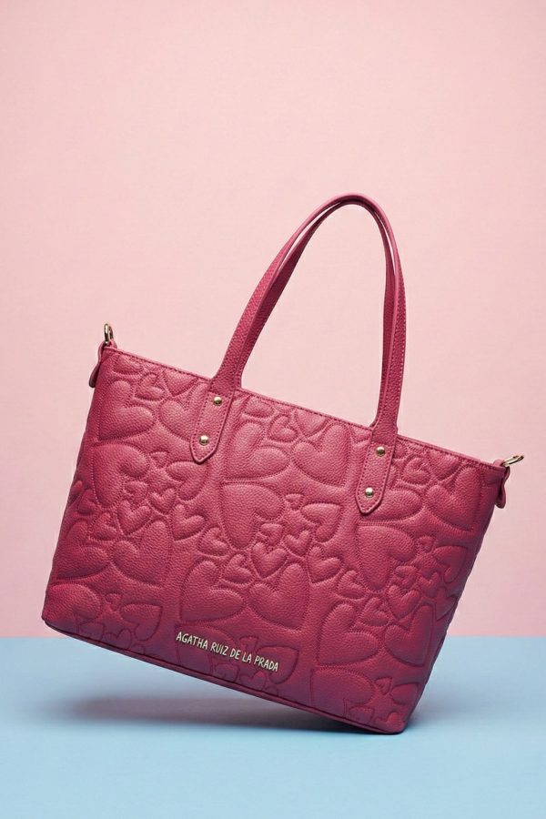 Bolso Agatha Ruiz de la Prada disponible en azul denim, fucsia y mostaza.