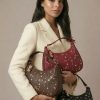 Bolso góndola pequeño con pedrería frontal