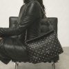Bolso elegante con doble cadena hombro negro