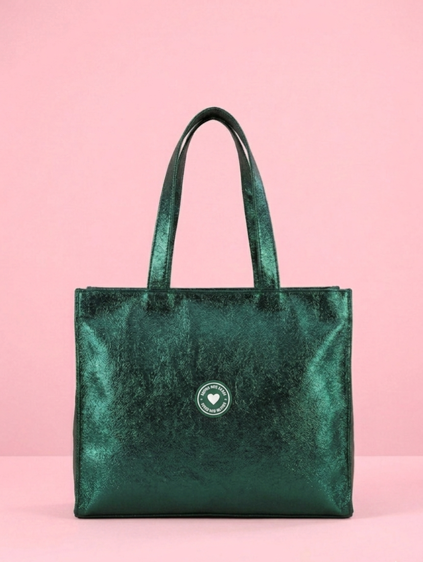 Tote bag grande de piel sintética con efecto purpurina. Bolsa shopper Agatha Ruiz de la Prada con acabado glitter metalizado verde