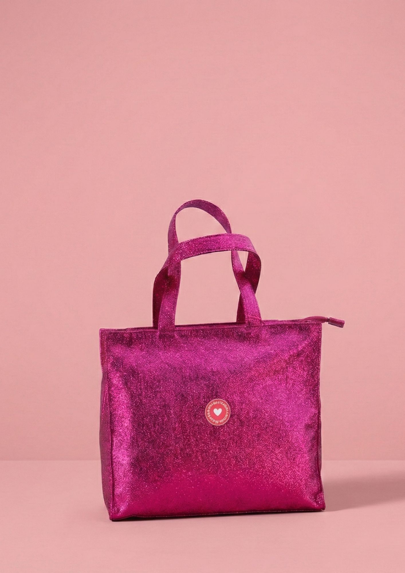 Bolso tote bag metalizado de Agatha Ruiz de la Prada rosa fucsia Bolsa shopper Agatha Ruiz de la Prada con acabado glitter metalizado. fucsia