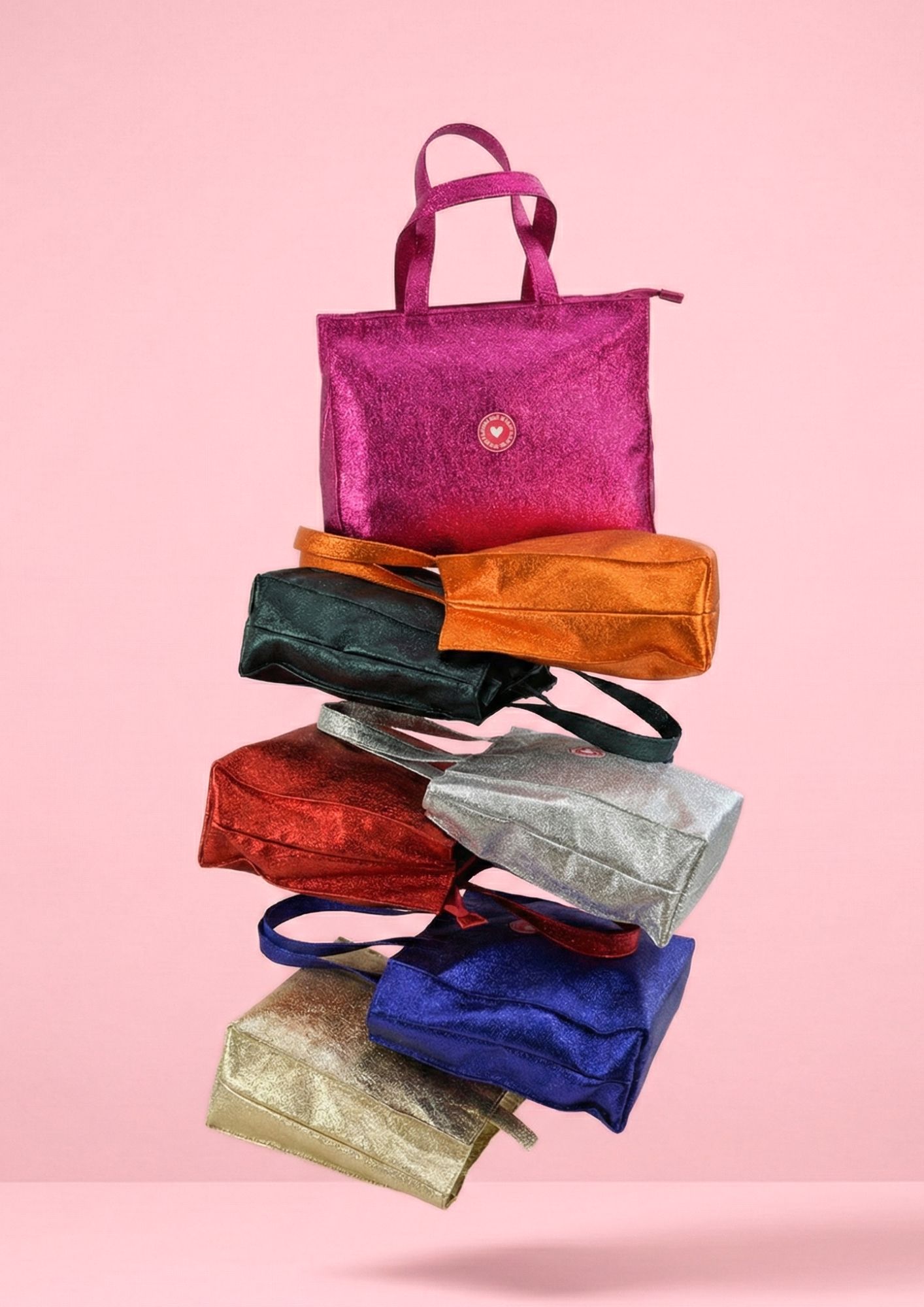 Bolsa de hombro glitter con gran capacidad para el día a día. Shopper brillante con cierre superior de cremallera.
